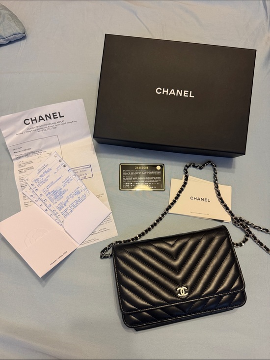 CHANEL Handbags - Chanel Black Quilted Chevron Flap Bag with Chain Strap